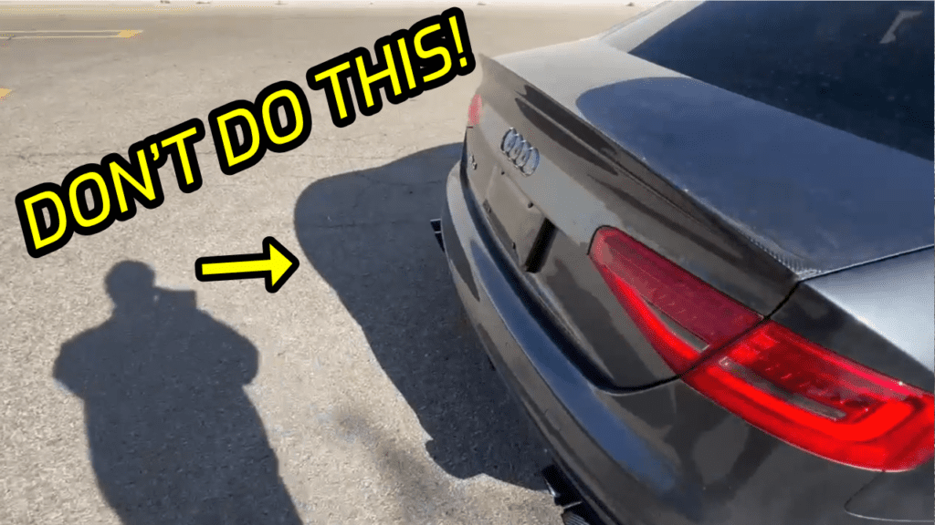 Picture of the rear of a B8 Audi S4 indicating to the viewer not to modify the exhaust like this.